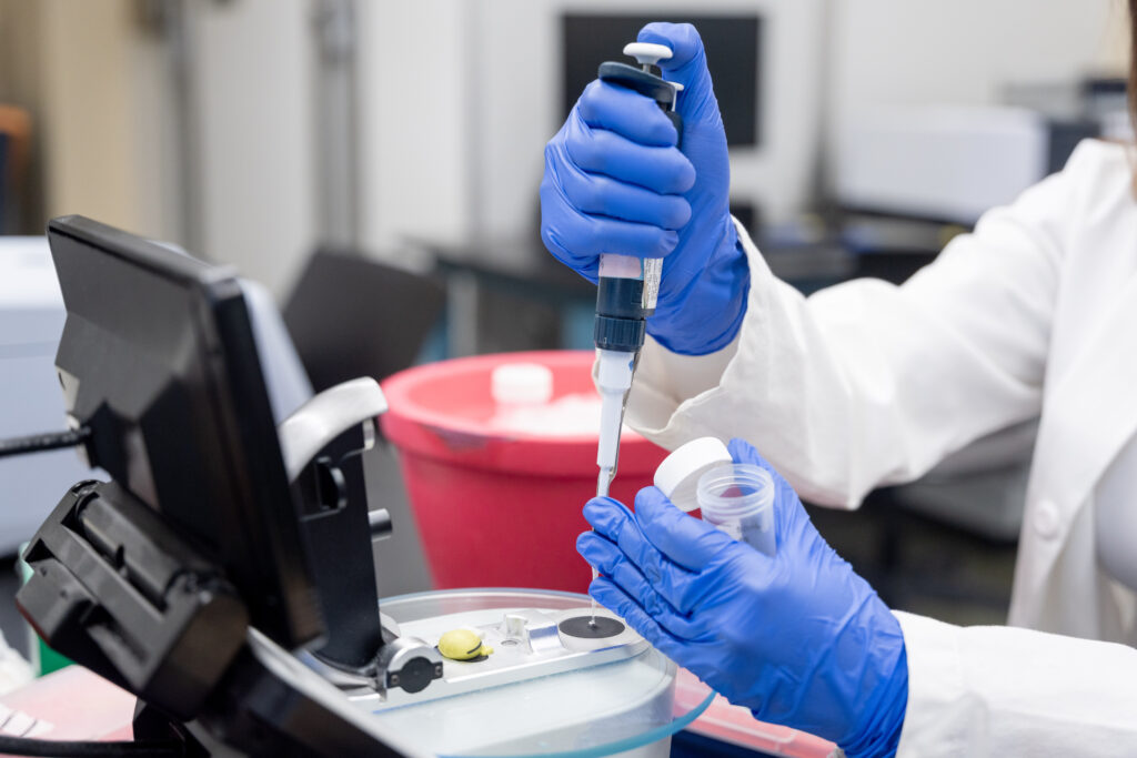 student works in science lab