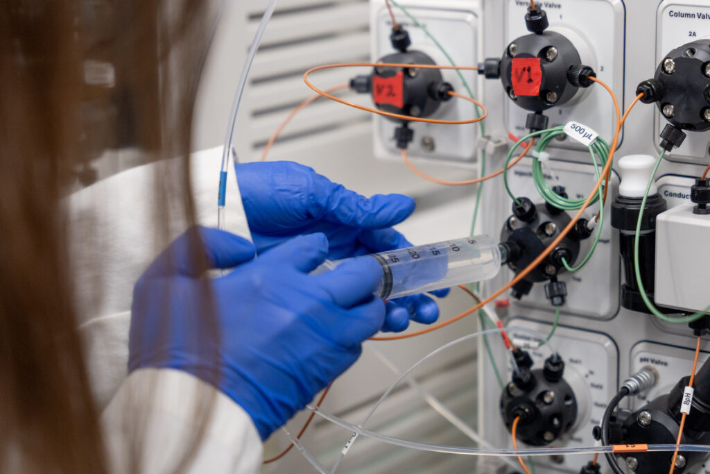 student works in science lab