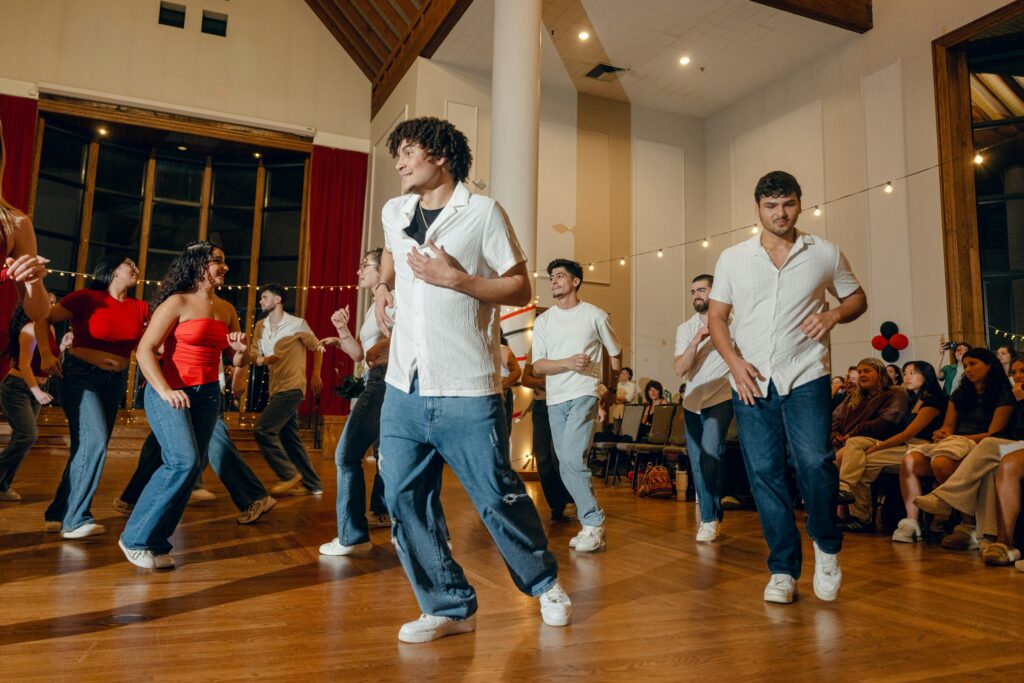 Debrin Adon Suero ’25 dances with Salsa Encendida. (Photo by Natalie Hoang '25, MBA '26)