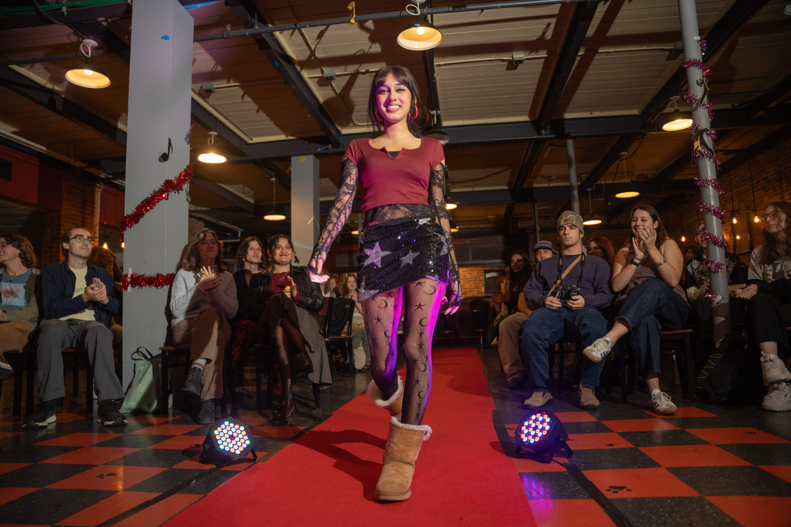 student walks in fashion show