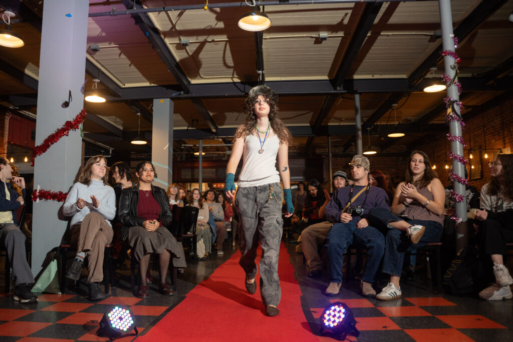 student walks in fashion show