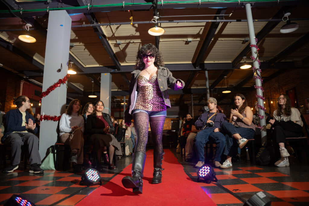 student walks in fashion show