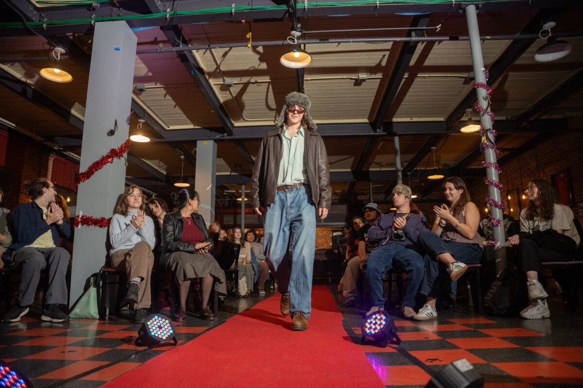student walks in fashion show