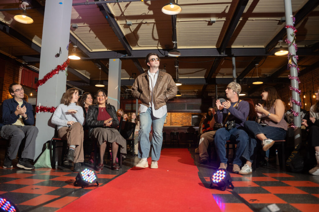 student walks in fashion show