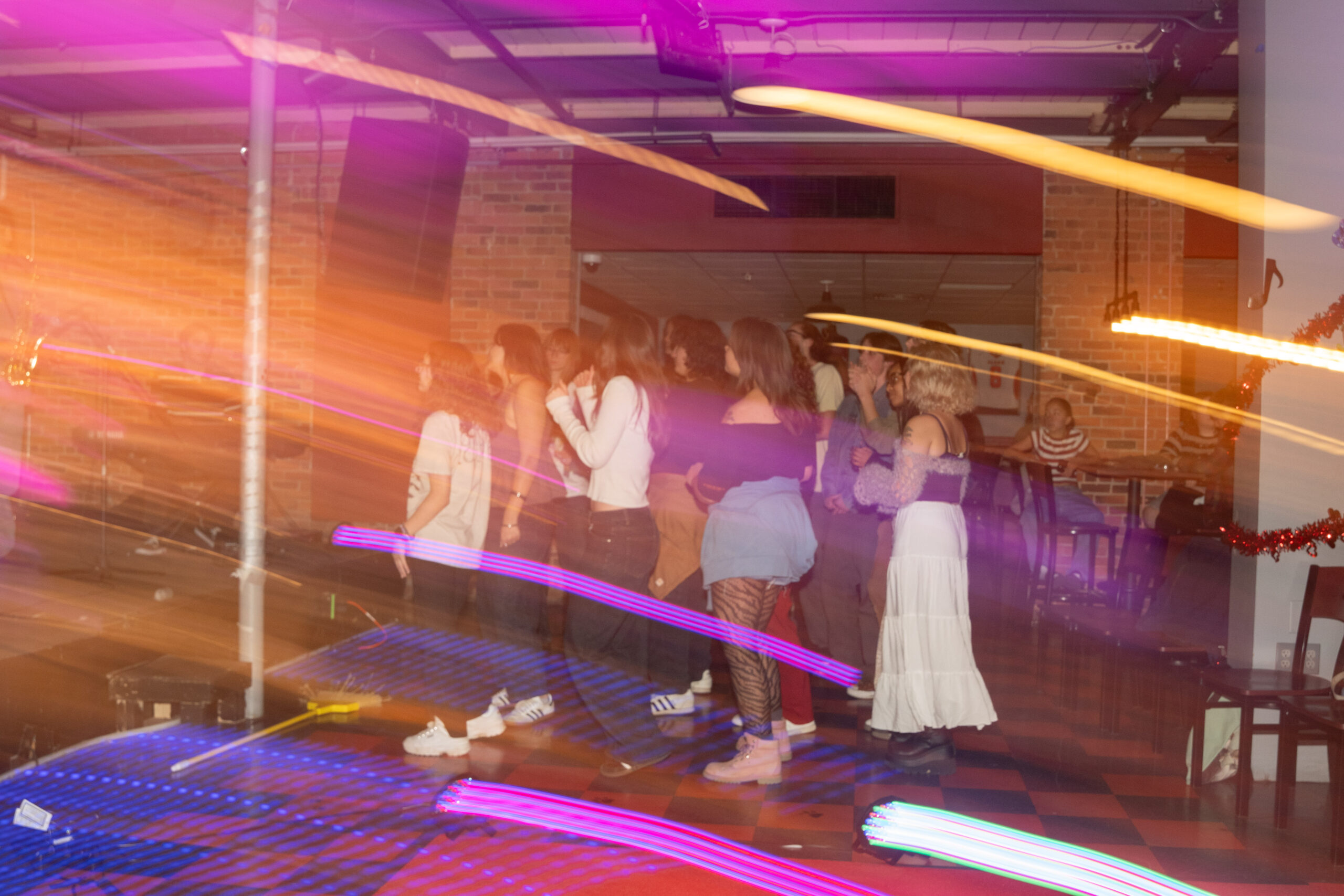 students watch band play