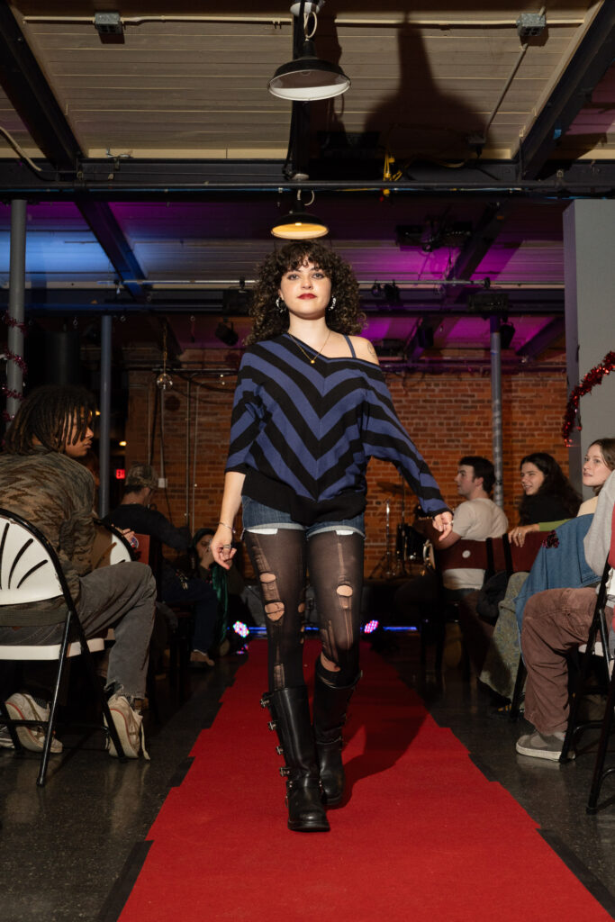 student walks in fashion show