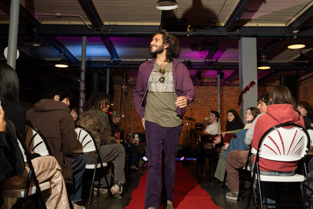 student walks in fashion show