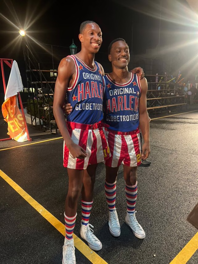 two actors dressed as Harlem Globetrotters
