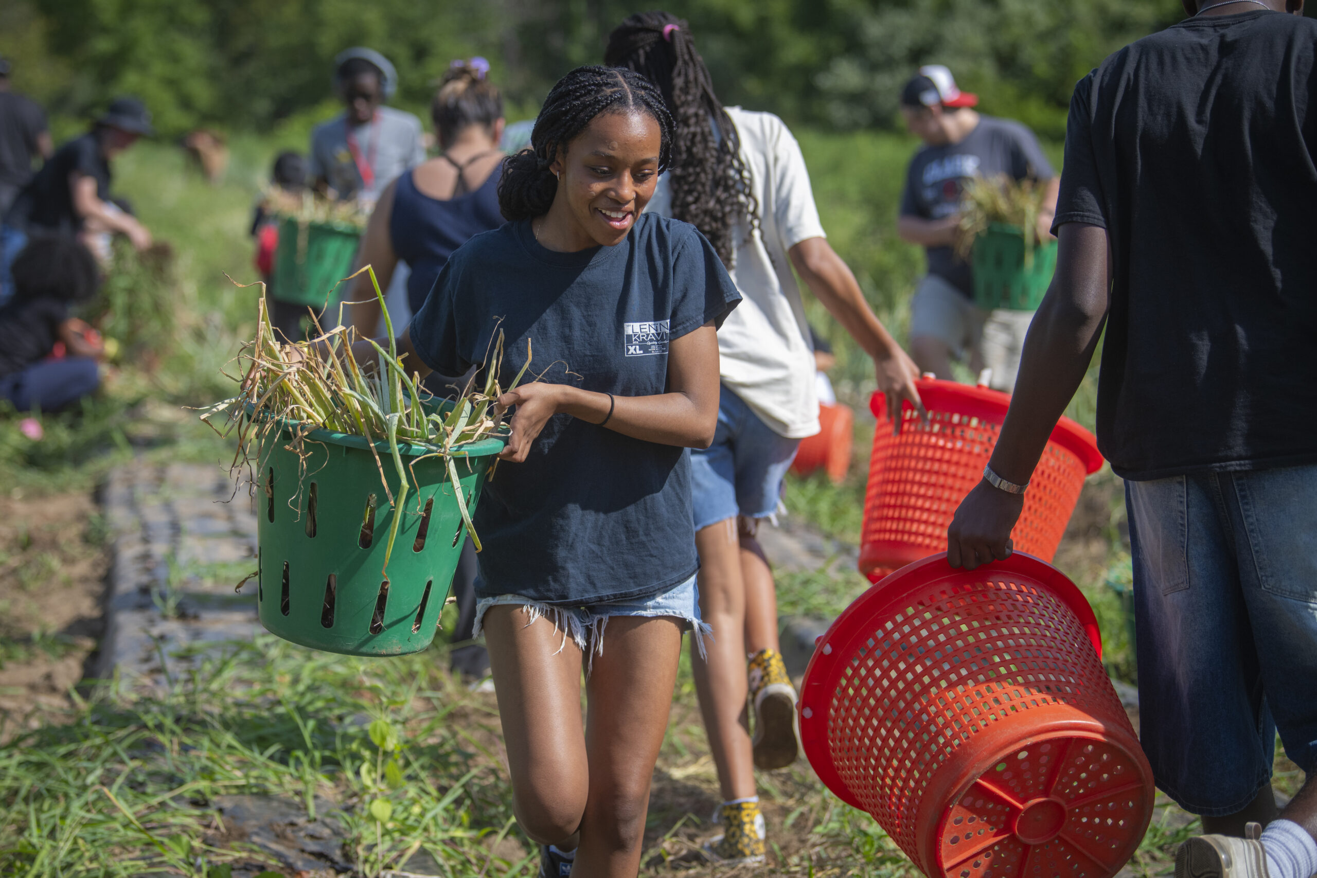 students work on farm
