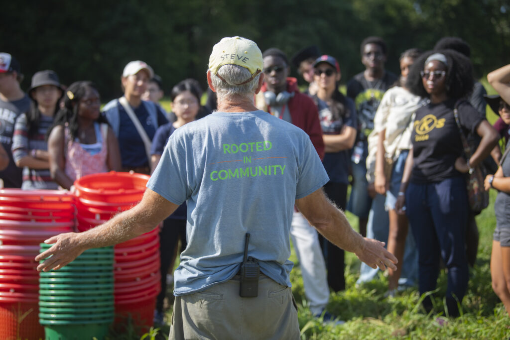 students work on farm