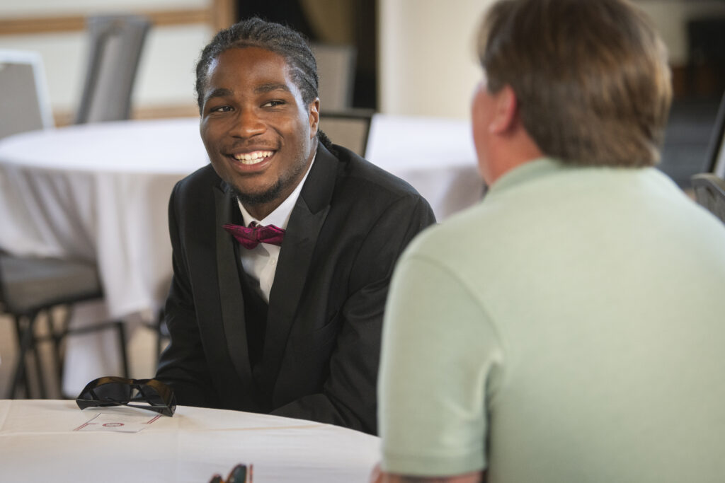 student sitting at table