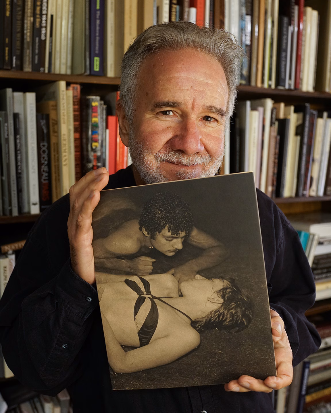 “Stephen DiRado with a prepublication copy of the Bell Pond photo collection