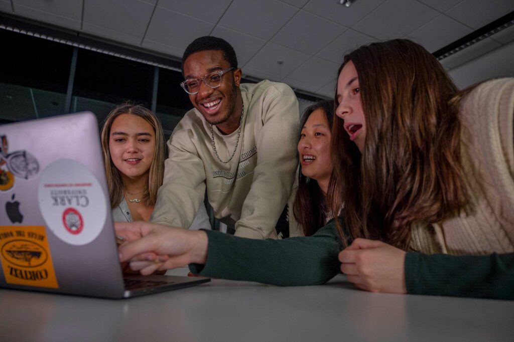 Computer science major, Isaac Tomeho ’26 participates in a group project of the Clark Competitive Computing Club