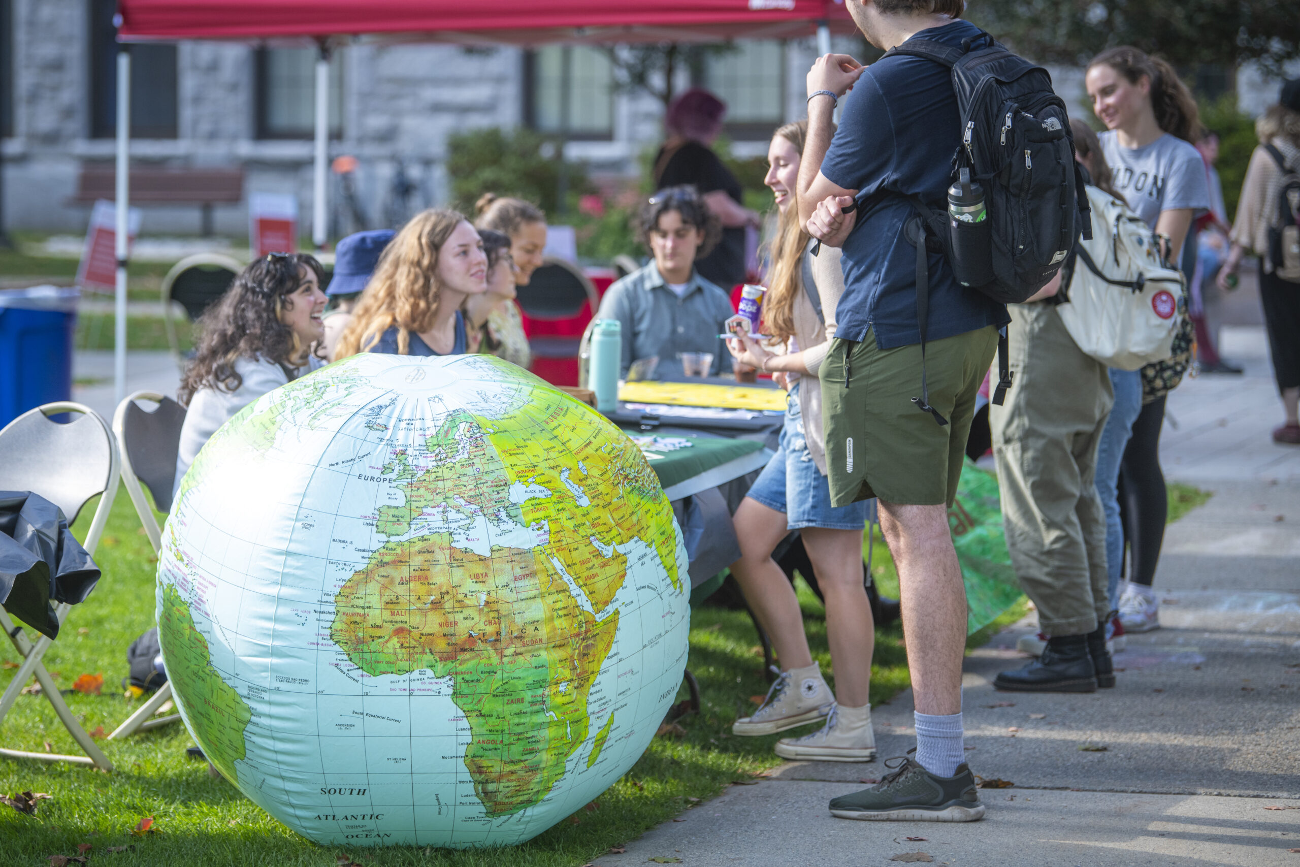 students table on campus green