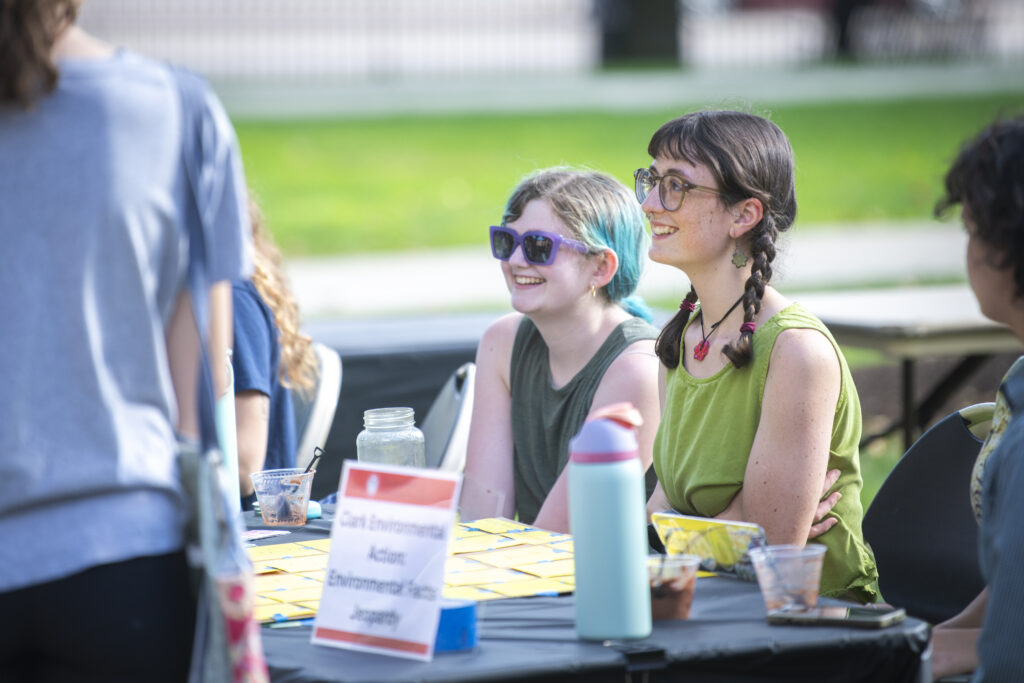 students table on campus green