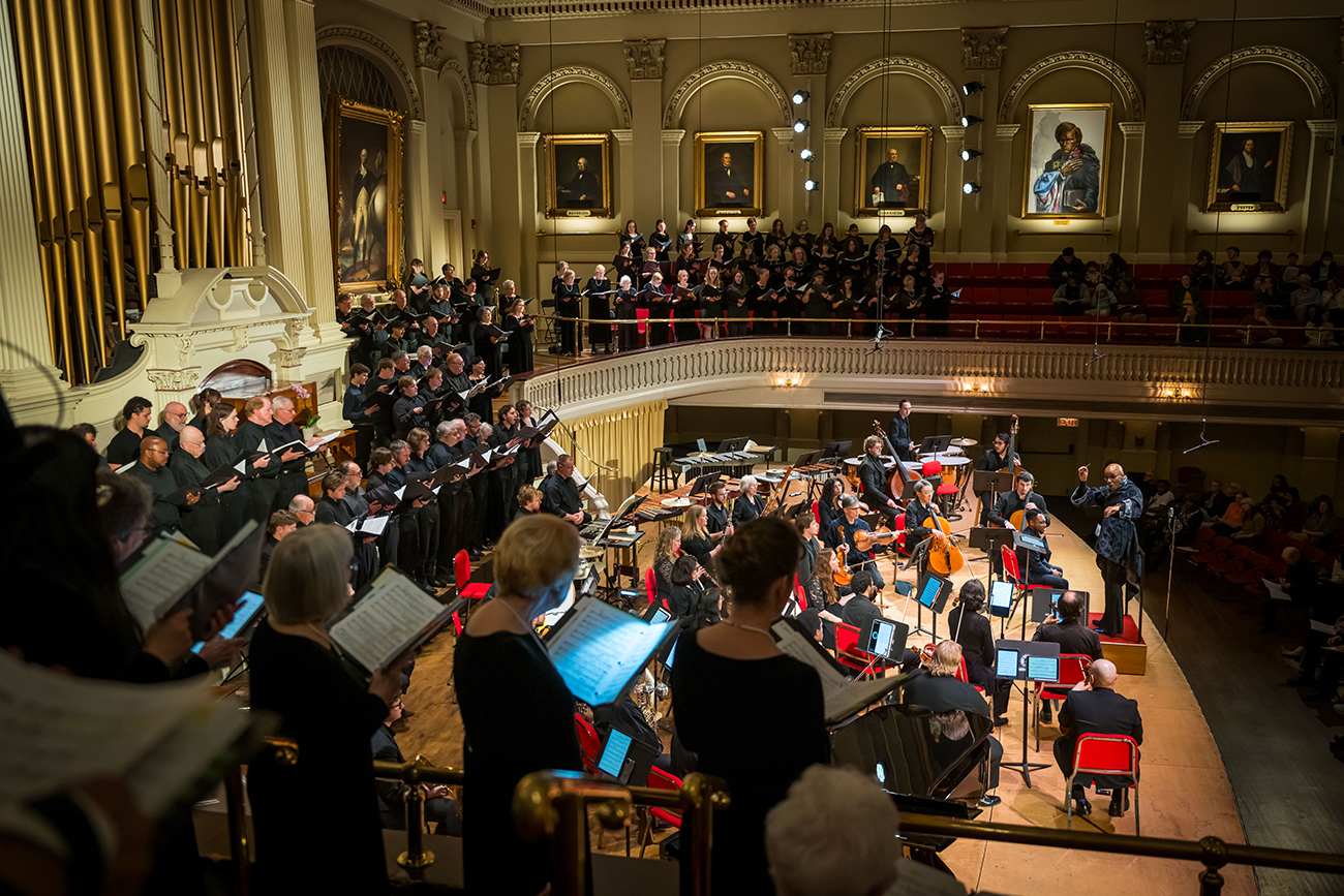 Cailin Marcel Manson conducts the New England Repertory Orchestra and the combined Worcester Chorus and Clark University Choir. Photo: Troy B. Thompson