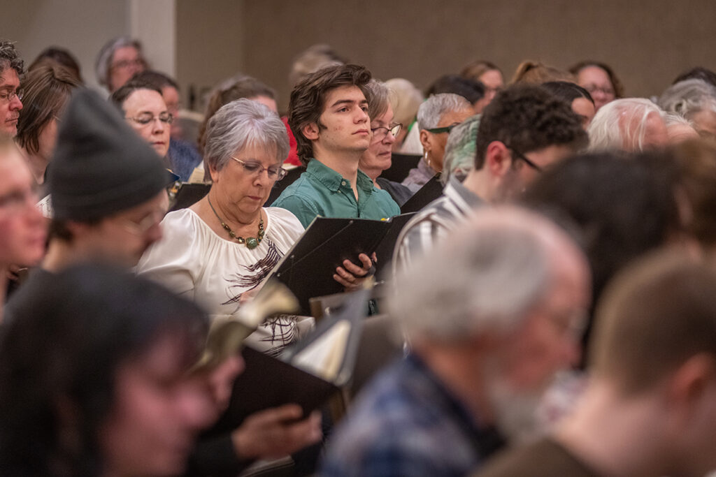Clark University Choir rehearsing for concert at Carnegie Hall