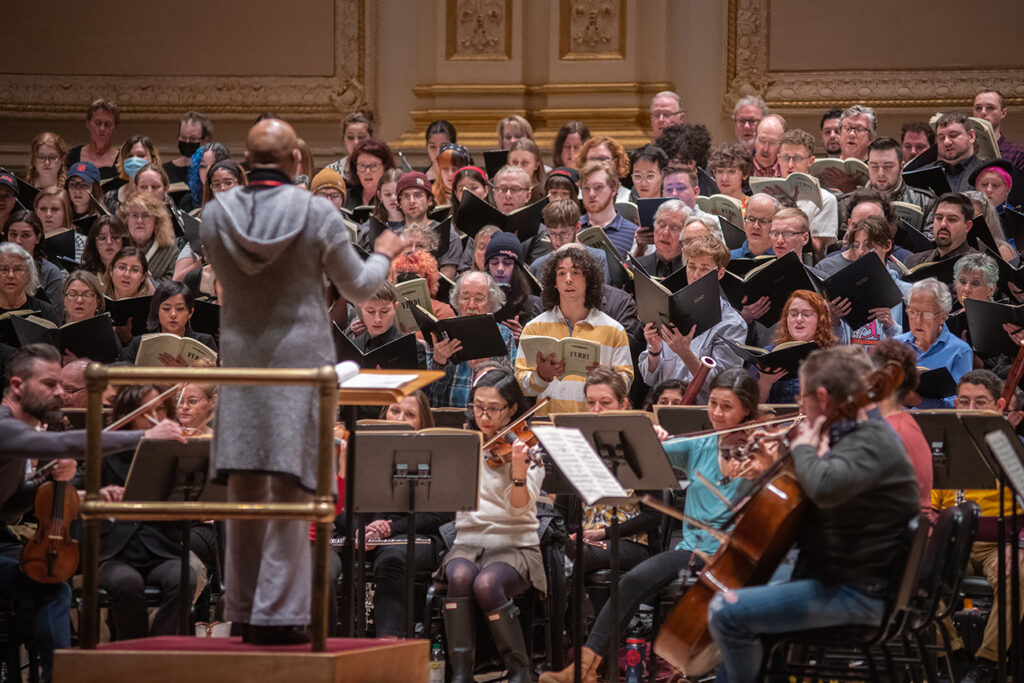 Clark University Choir rehearsing at Carnegie Hall
