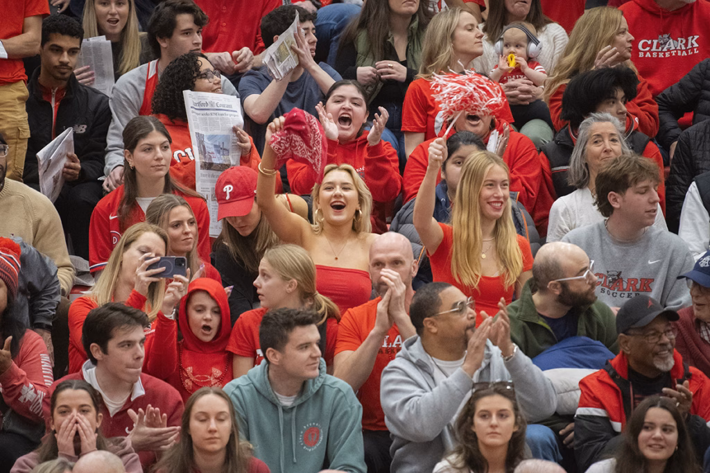 Game attendees cheer for the Clark Cougars