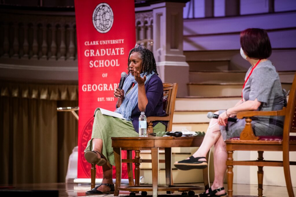 Keynote speaker Beverley Mullings, professor of political economy at the University of Toronto, left, answers questions from the audience. At right is moderator Siobhan McGrath, associate professor of geography at Clark.