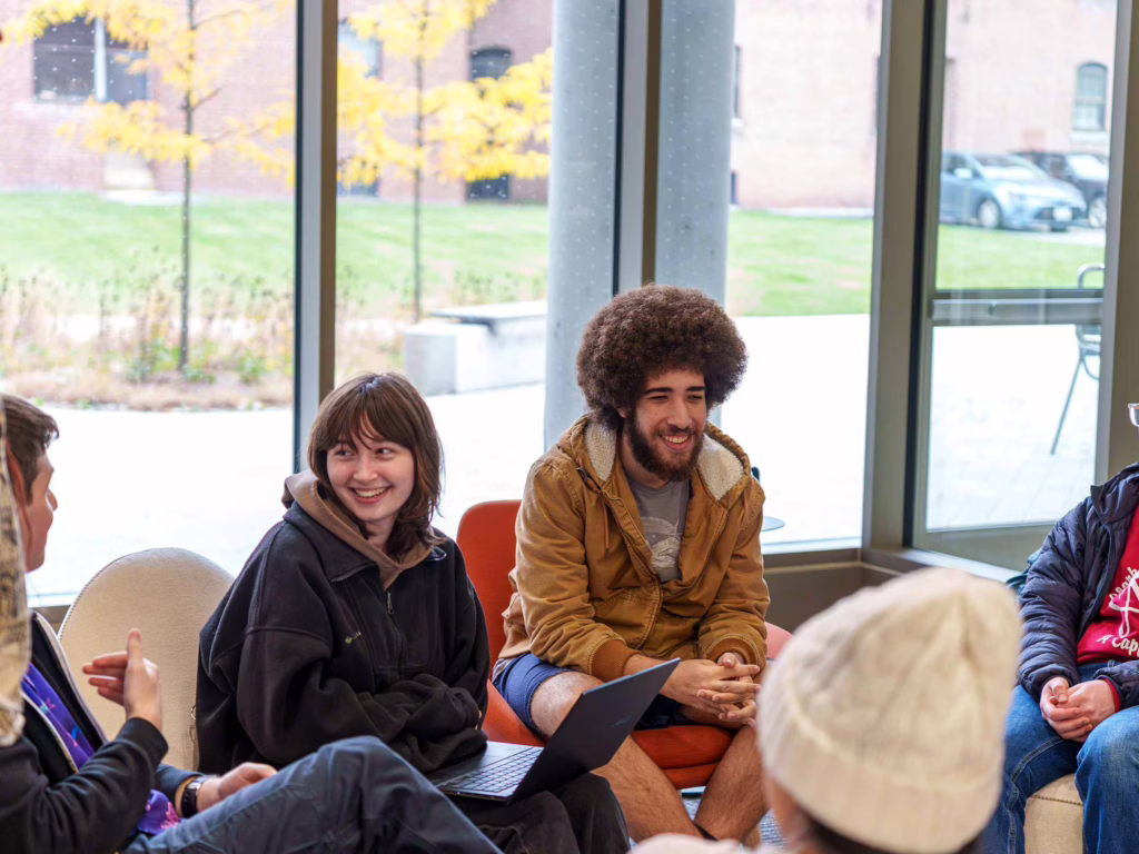 Students in conversation during ClarkFest, a showcase of student work at the Center for Media Arts, Computing, and Design