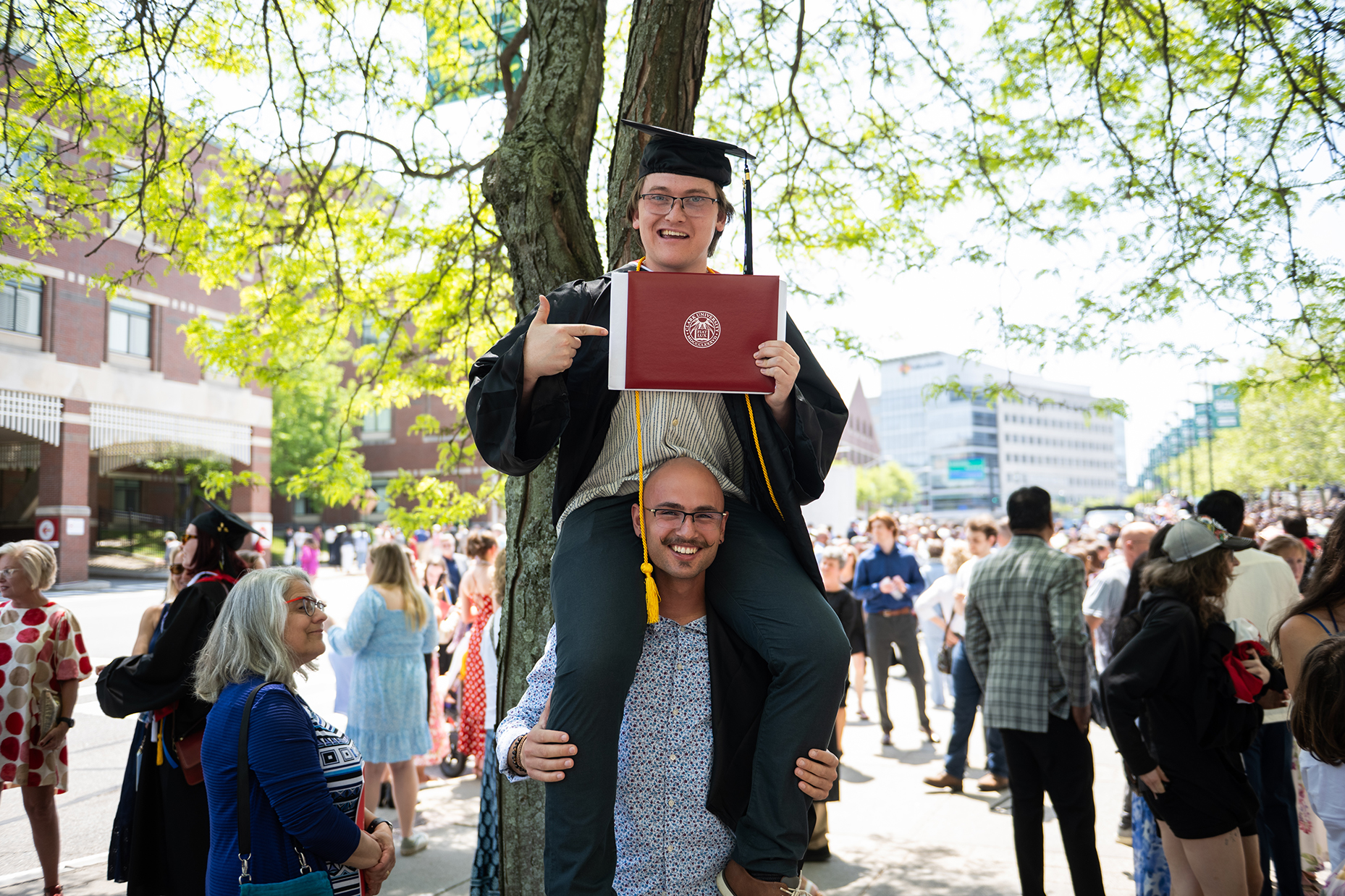 Family celebrates after Clark University Commencement