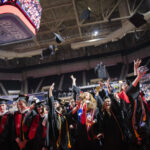 Graduates toss caps at Clark University Commencement