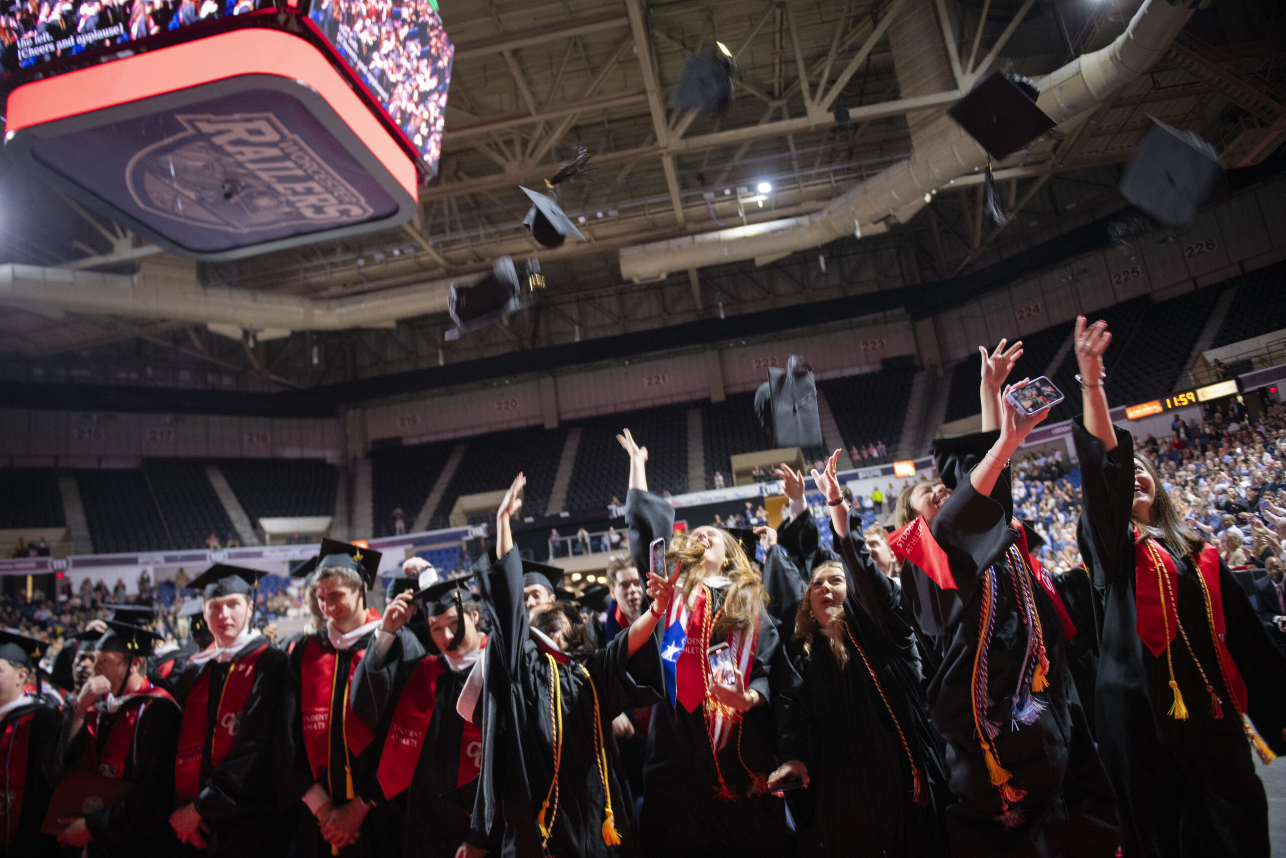 Graduates toss caps at Clark University Commencement