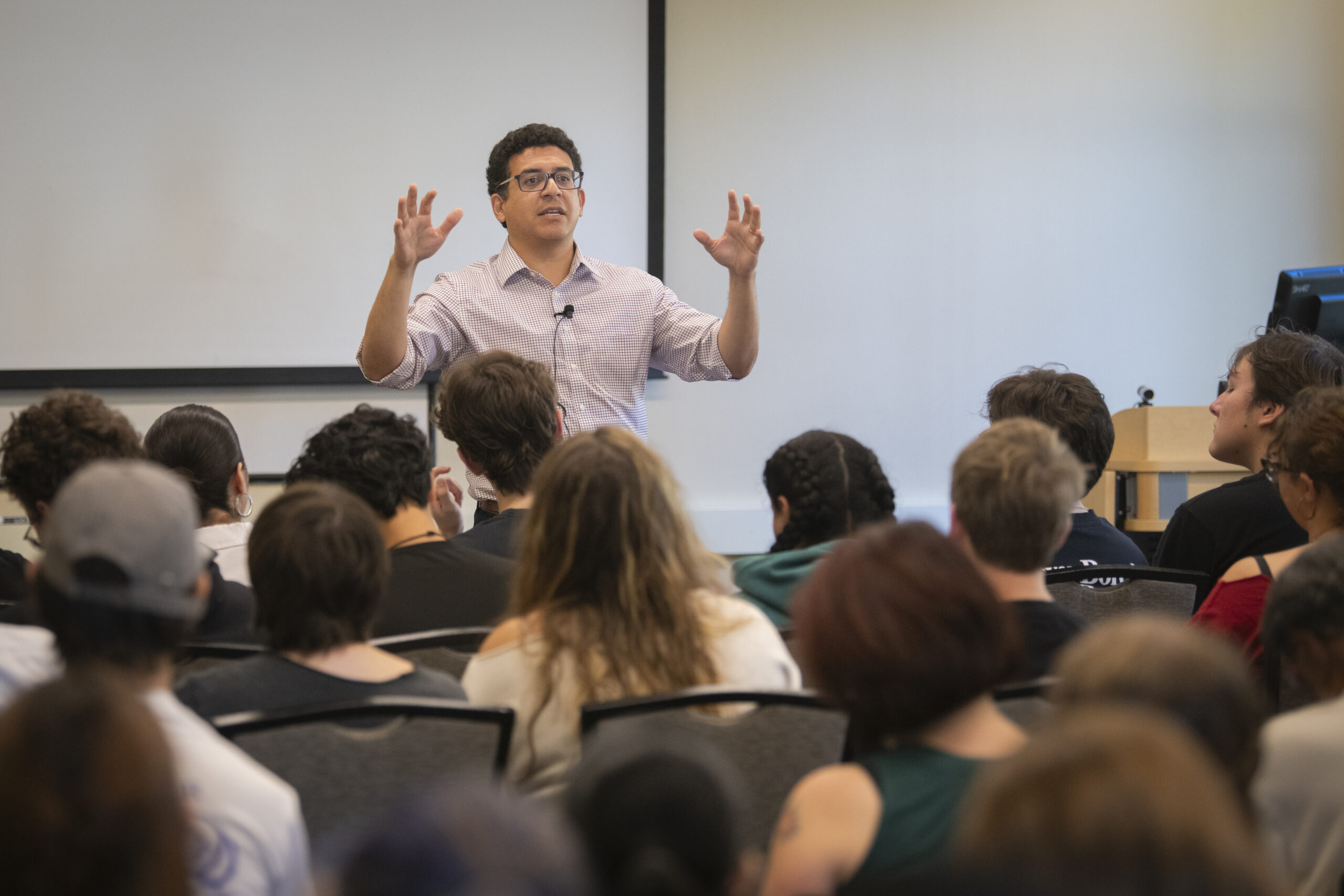 professor speaks to audience