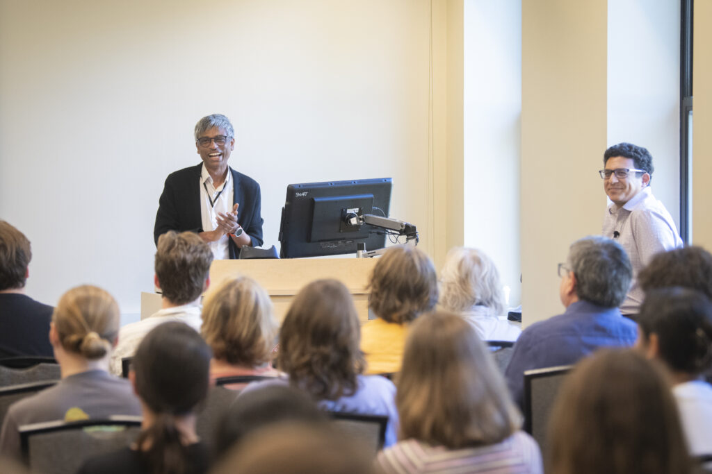 two professors at front of room