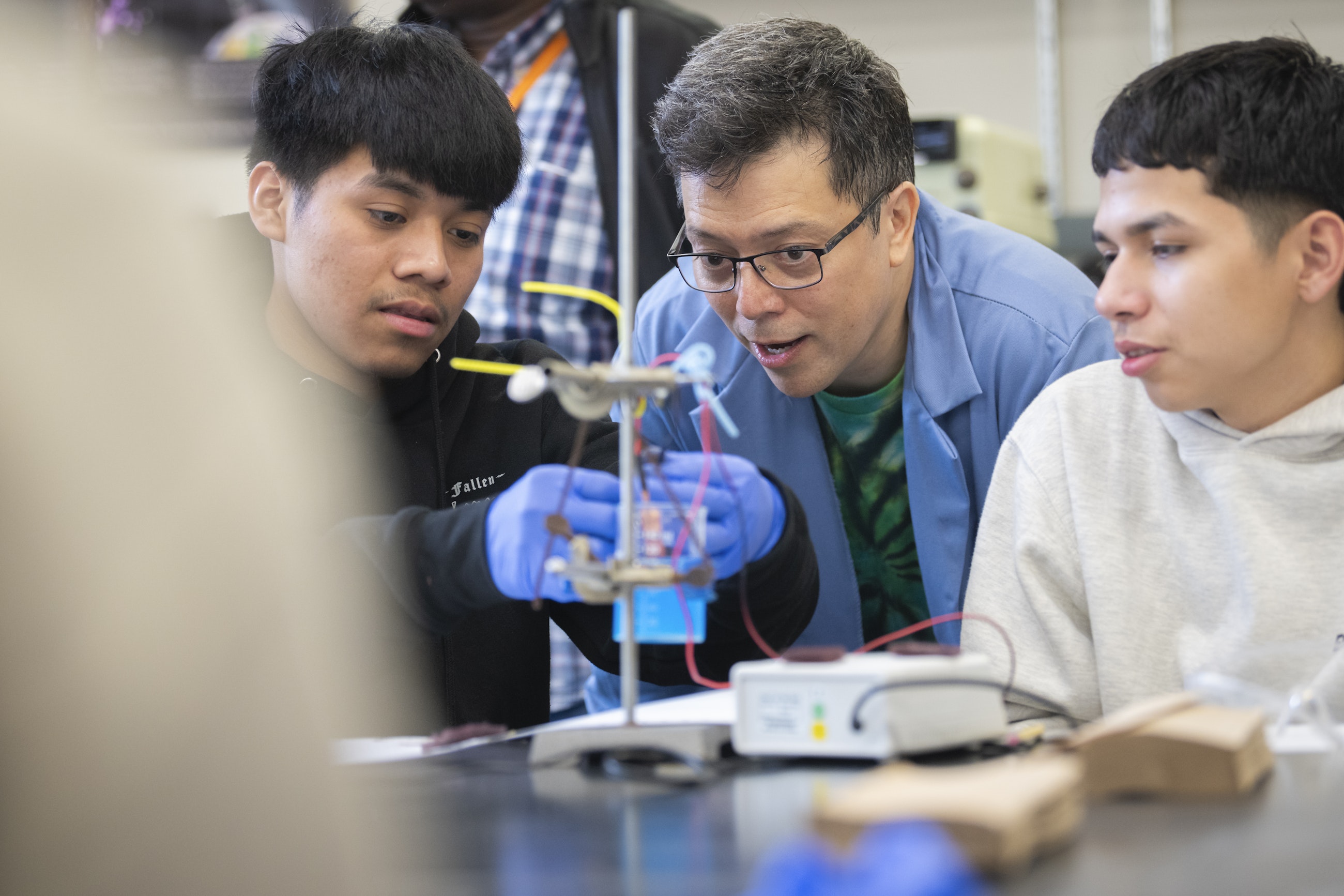 Worcester high school students conducting chemistry experiment at Clark