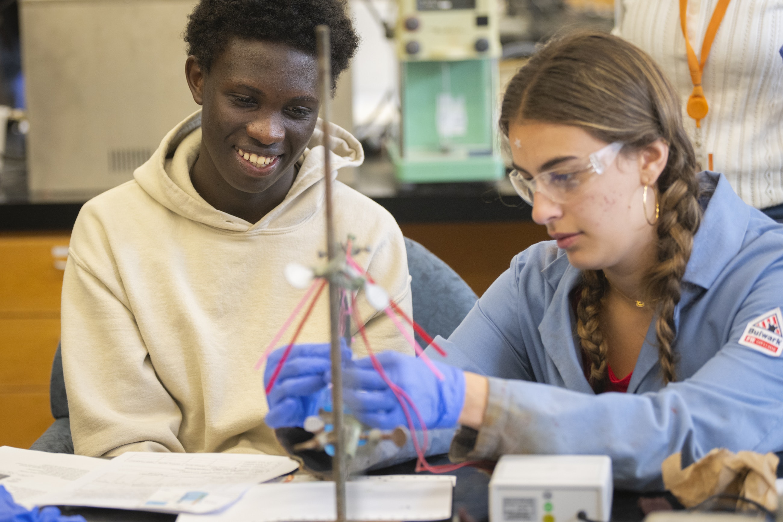Worcester high school students conducting chemistry experiment at Clark