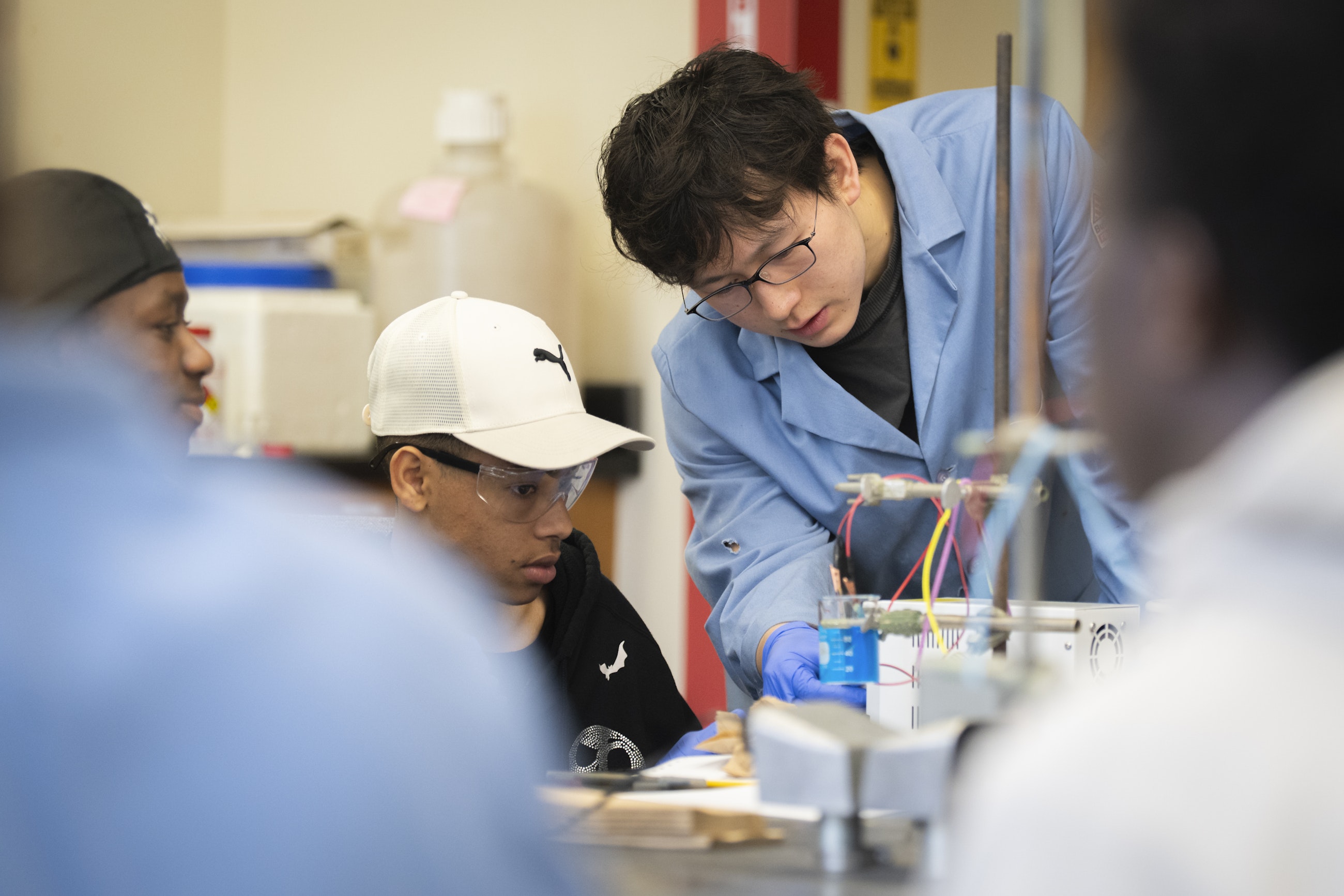 Worcester high school students conducting chemistry experiment at Clark