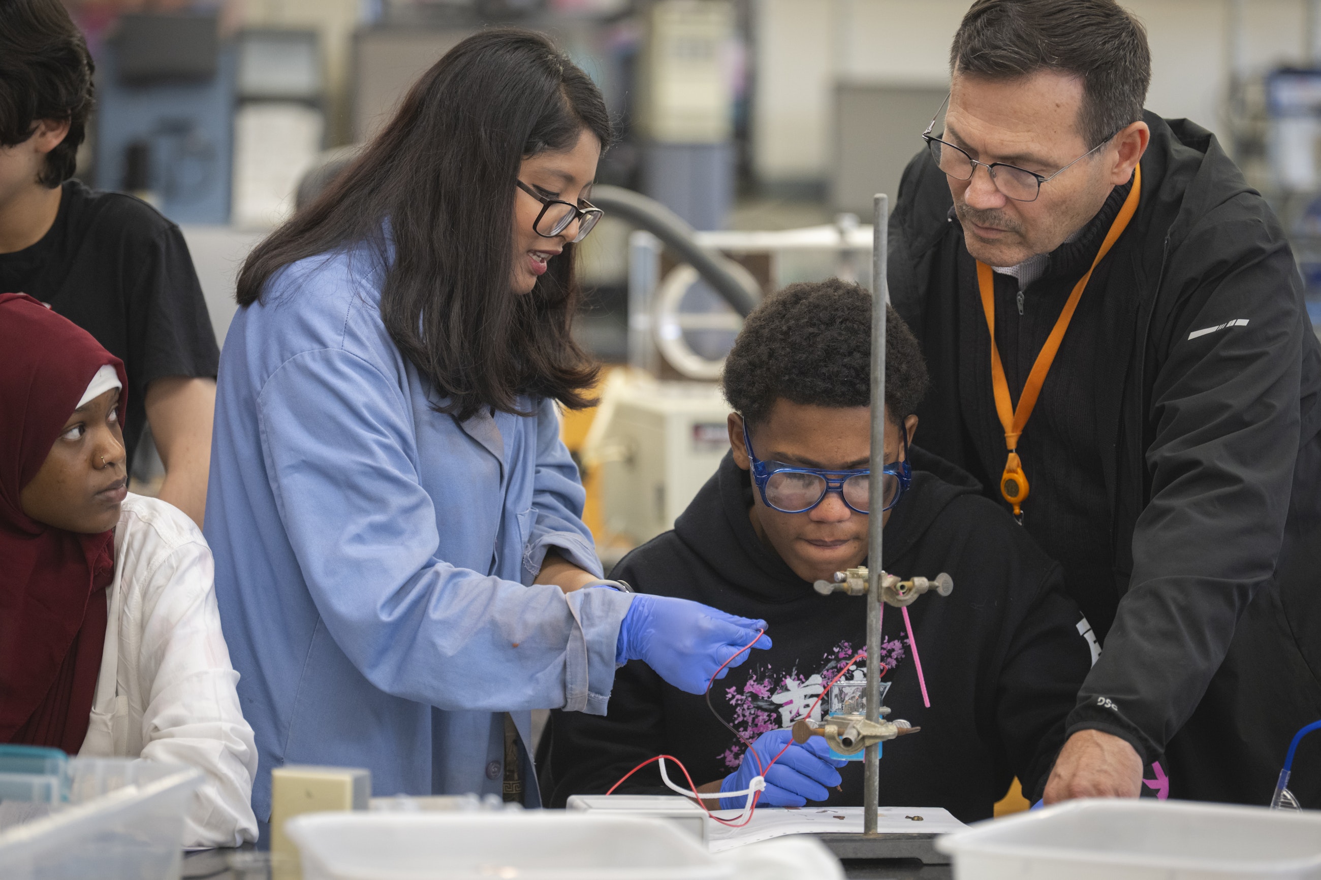 Worcester high school students conducting chemistry experiment at Clark