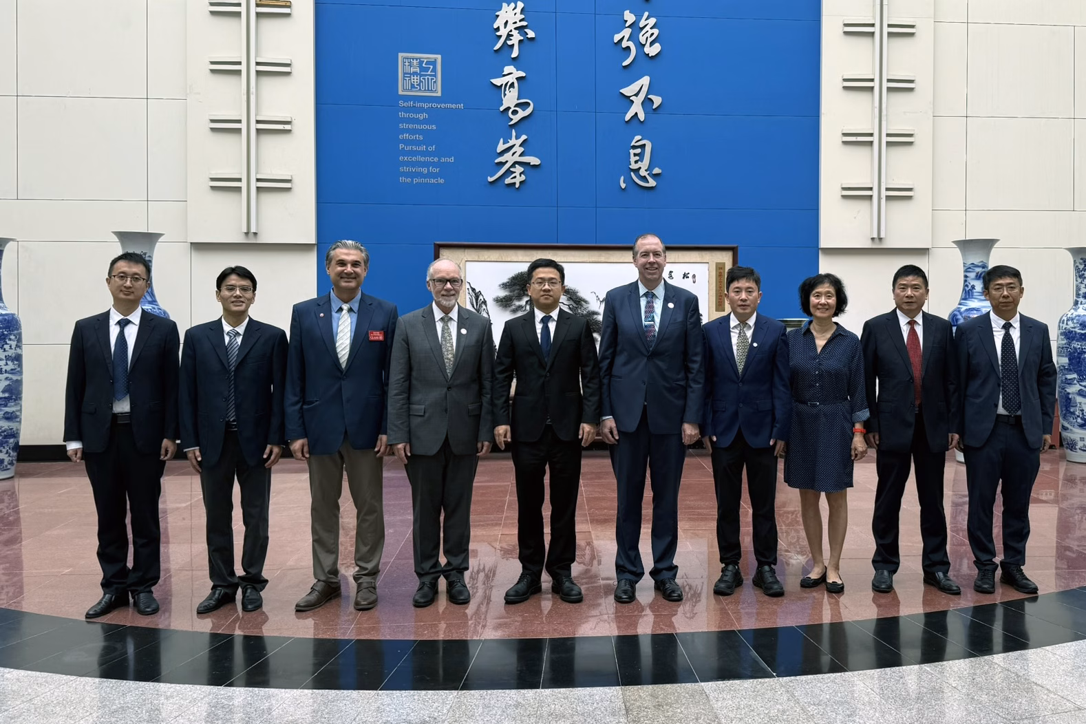 Officials from Clark University and Hefei University of Technology stand together in Hefei