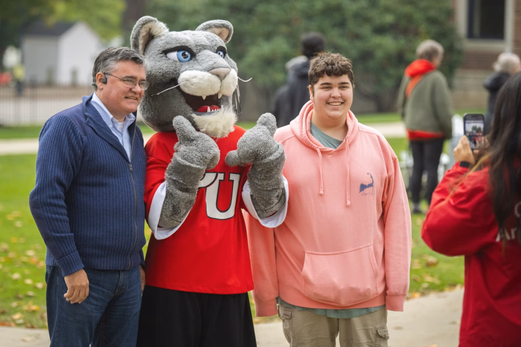 people gather on campus green