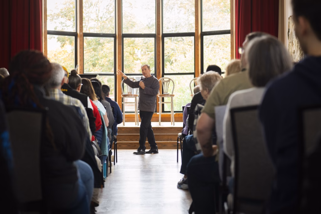 university president addresses group