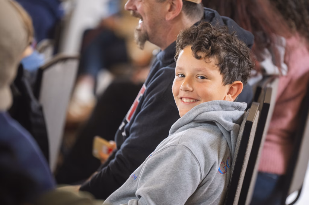 child smiles at camera