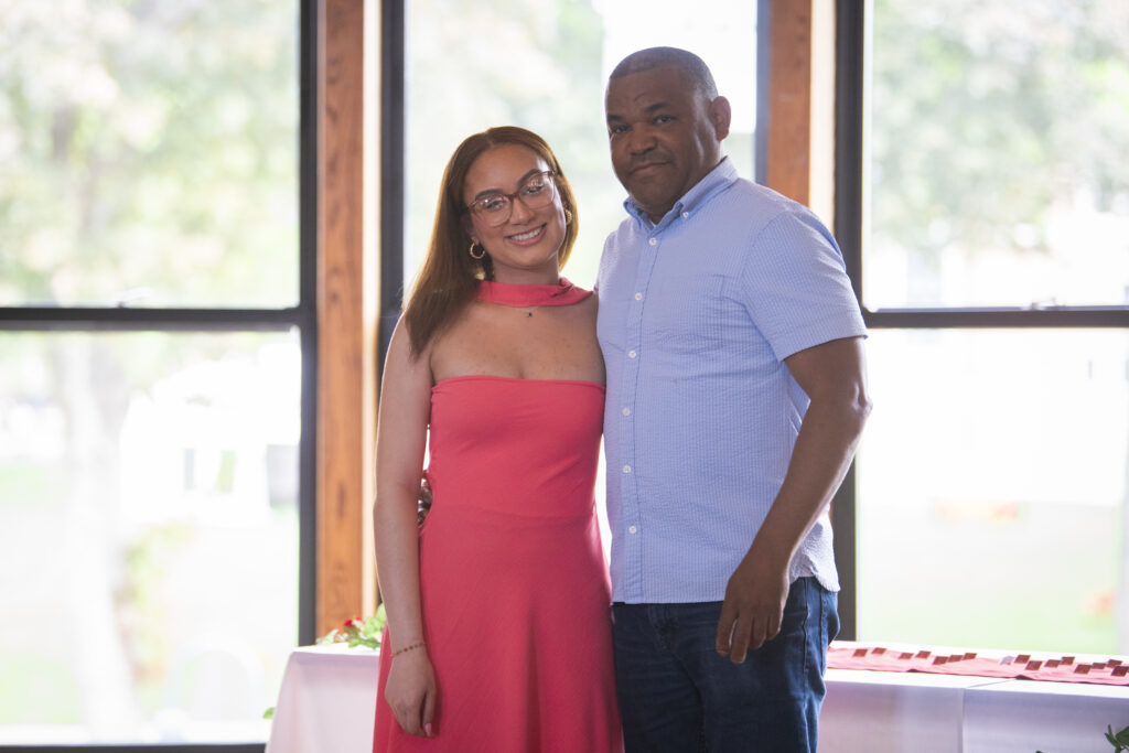 people pose for photos at First-Gen Pinning Ceremony