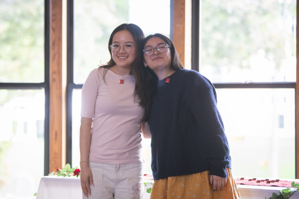 people pose for photos at First-Gen Pinning Ceremony