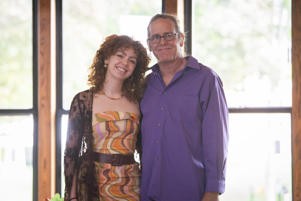 people pose for photos at First-Gen Pinning Ceremony