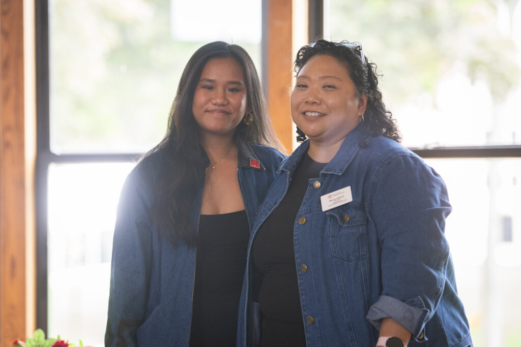 people pose for photos at First-Gen Pinning Ceremony