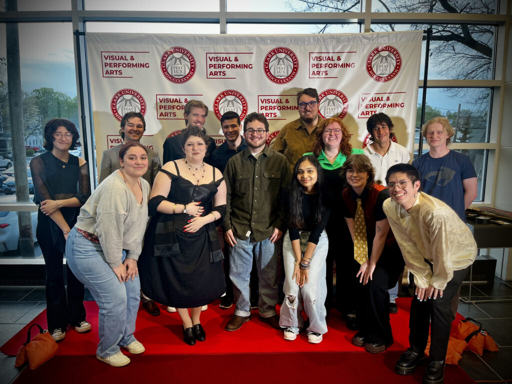 students pose for photos