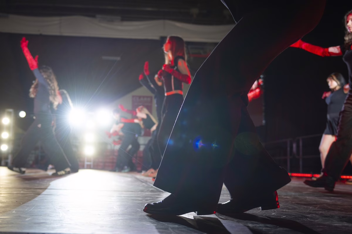 people on stage dancing