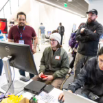 students play game at conference