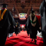 Graduate students process into their Commencement ceremony. Photo by Collin Hamilton ’27