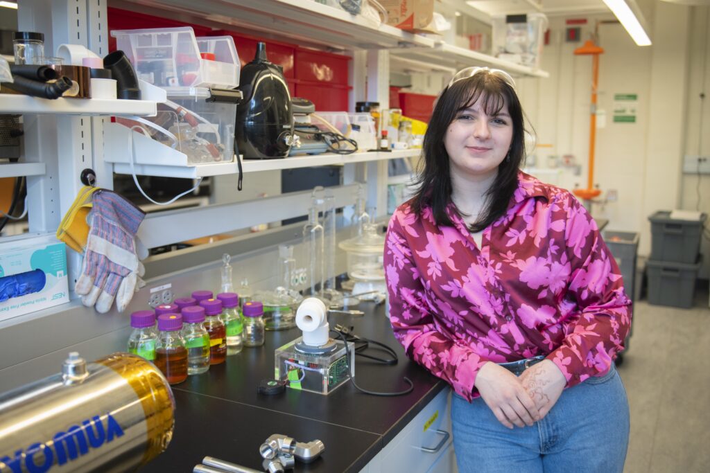 Katelynn Humphrey ’25 posing in the Julio D'Arcy lab