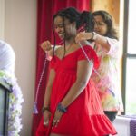student gets graduation cord at lavender ceremony