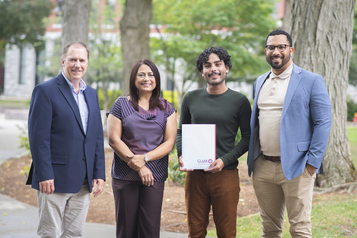 Clark University President David Fithian, Professor Rinku Roy Chowdhury, Ryan Saboia ’26, and Vice President Joseph Corazzini