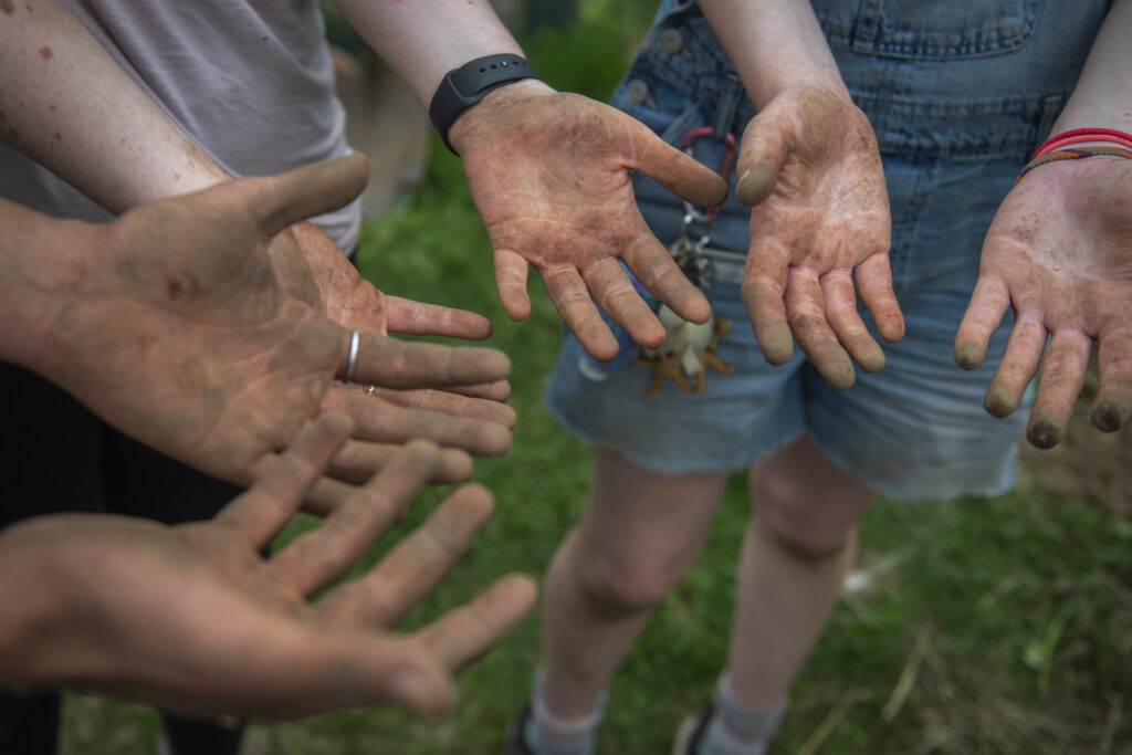 hands covered in dirt